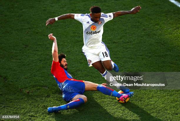 James Tomkins of Crystal Palace tackles Jermain Defoe of Sunderland during the Premier League match between Crystal Palace and Sunderland at Selhurst...