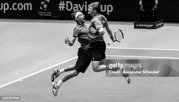 Ruben Bemelmans of Belgium and Joris De Loore of Belgium celebrate the victory during day two of the Davis Cup World Group first round between...
