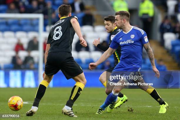 Joe Ralls of Cardiff City is challenged by Jonny Howson of Norwich City during the Sky Bet Championship match between Cardiff City and Norwich City...