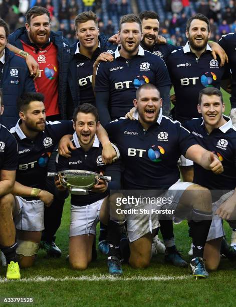 Scotland captain Greig Laidlaw and team mates celebrate after the RBS Six Nations match between Scotland and Ireland at Murrayfield Stadium on...