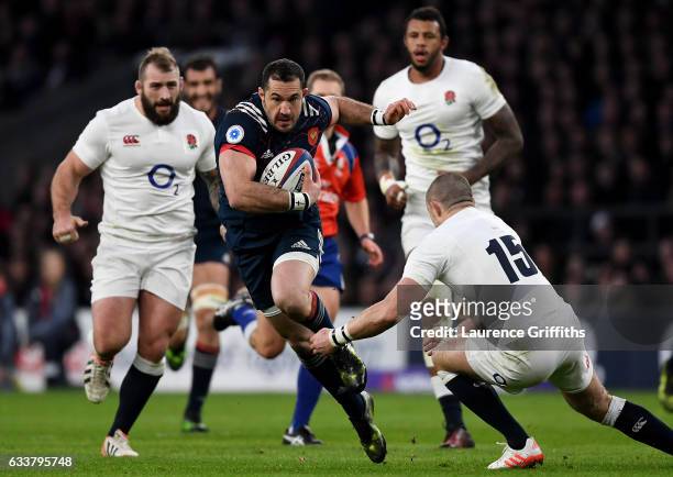 Scott Spedding of France is tackled by Mike Brown of England during the RBS Six Nations match between England and France at Twickenham Stadium on...