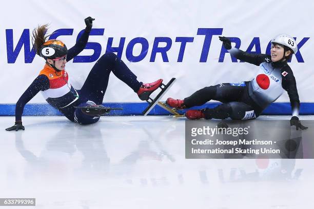 Ayuko Ito of Team Japan and Suzanne Schulting of Team Netherlans crash in the Ladies 3000m relay semi finals during day one of the ISU World Cup...