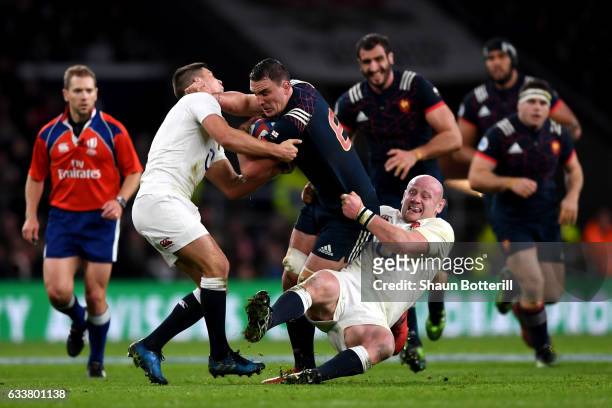 Louis Picamoles of France is tackled by Dan Cole and Ben Youngs of England during the RBS Six Nations match between England and France at Twickenham...