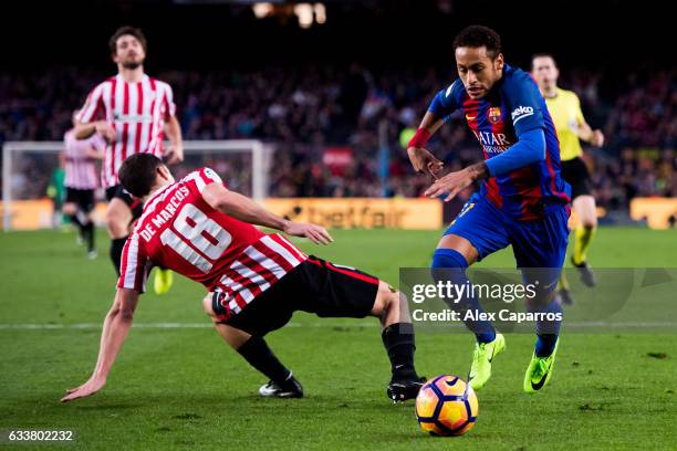 Neymar Santos Jr of FC Barcelona dribbles Oscar de Marcos of Athletic Club during the La Liga match between FC Barcelona and Athletic Club at Camp...