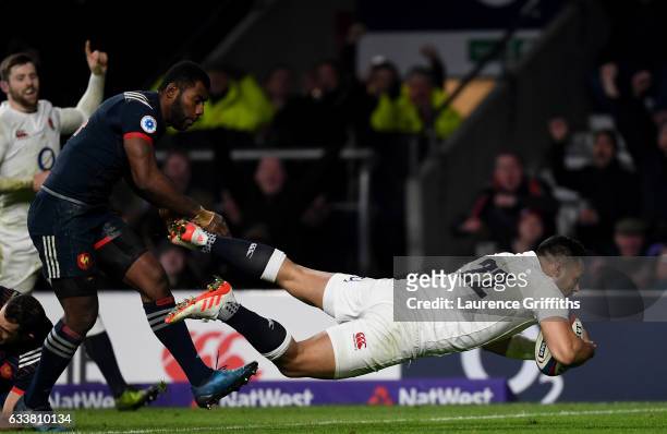 Ben Te'o of England dives to score his side's first try during the RBS Six Nations match between England and France at Twickenham Stadium on February...