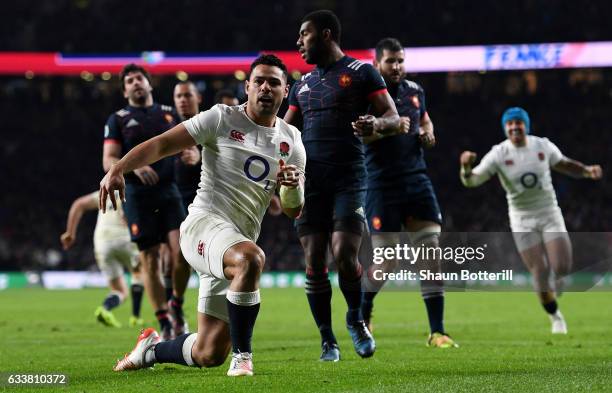 Ben Te'o of England celebrates scoring his side's first try during the RBS Six Nations match between England and France at Twickenham Stadium on...