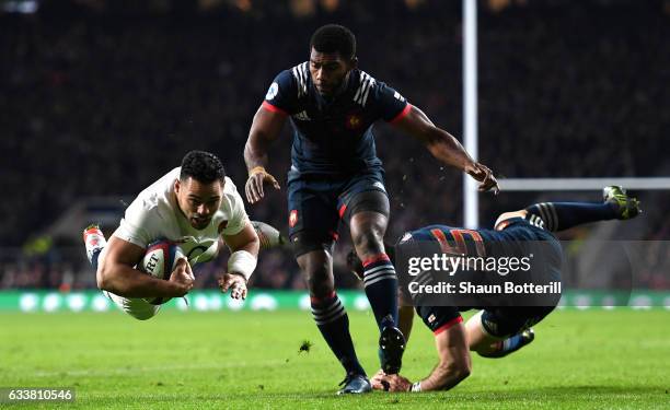 Ben Te'o of England dives to score his side's first try during the RBS Six Nations match between England and France at Twickenham Stadium on February...