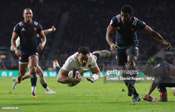Ben Te'o of England dives over to score his team's first try during the RBS Six Nations match between England and France at Twickenham Stadium on...