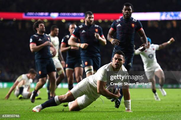 Ben Te'o of England celebrates scoring his side's first try during the RBS Six Nations match between England and France at Twickenham Stadium on...