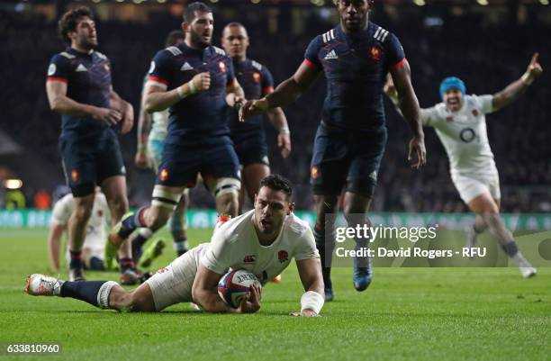 Ben Te'o of England celebrates after scoring his team's first try during the RBS Six Nations match between England and France at Twickenham Stadium...