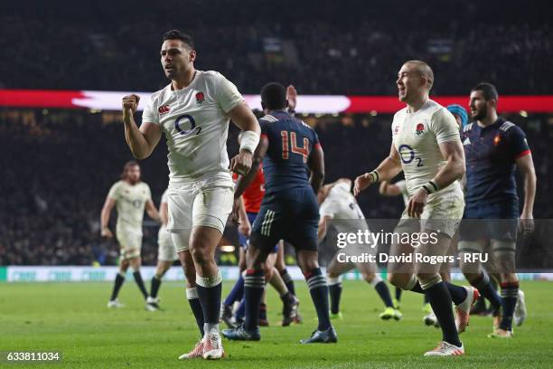 Ben Te'o of England celebrates after scoring his team's first try during the RBS Six Nations match between England and France at Twickenham Stadium...