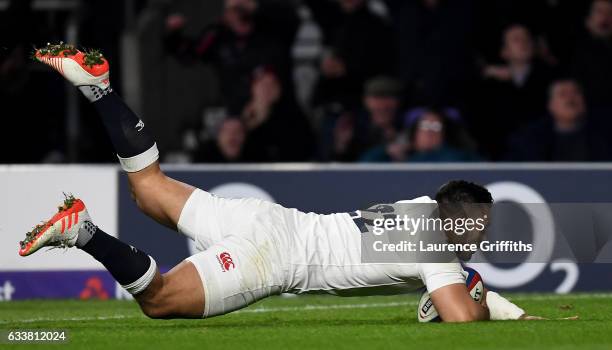 Ben Te'o of England dives to score his side's first try during the RBS Six Nations match between England and France at Twickenham Stadium on February...