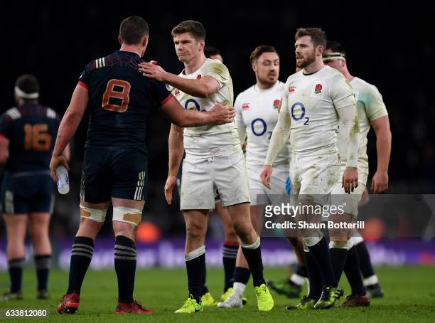 Owen Farrell of England and Louis Picamoles of France shake hands after the RBS Six Nations match between England and France at Twickenham Stadium on...