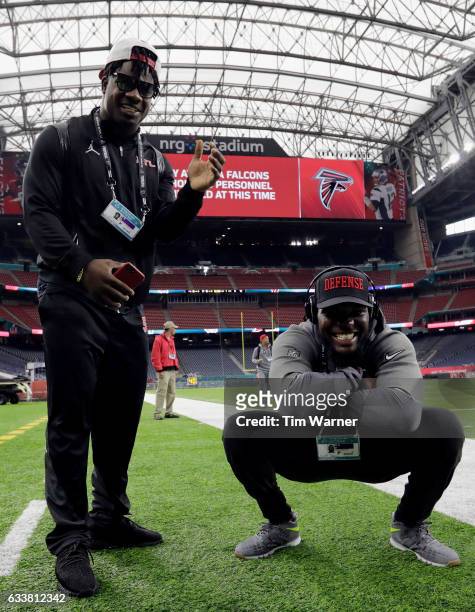 LaRoy Reynolds of the Atlanta Falcons and Sean Weatherspoon pose for a photo during the Super Bowl LI team walk through at NRG Stadium on February 4,...