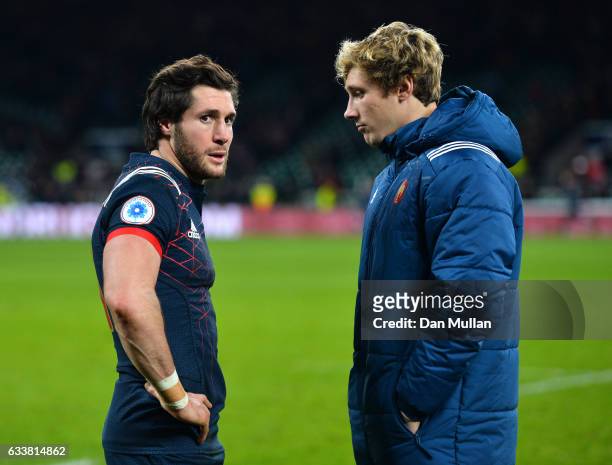 Maxime Machenaud and Baptiste Serin of France show dejection after the RBS Six Nations match between England and France at Twickenham Stadium on...