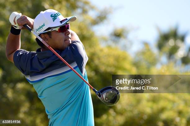 Hideki Matsuyama of Japan plays his tee shot on the fifth hole during the third round of the Waste Management Phoenix Open at TPC Scottsdale on...