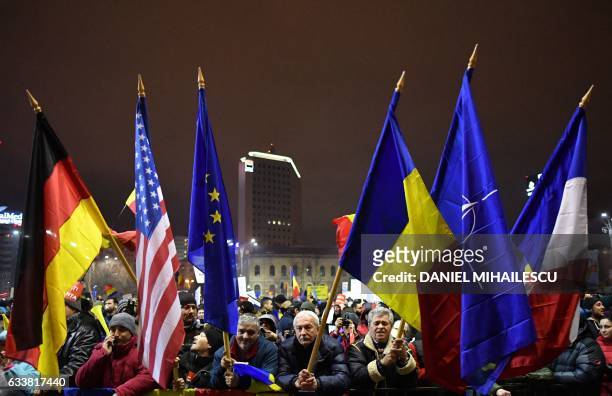 People protest in front of the government headquarters in Bucharest, against the government's contentious corruption decree February 4, 2017. -...