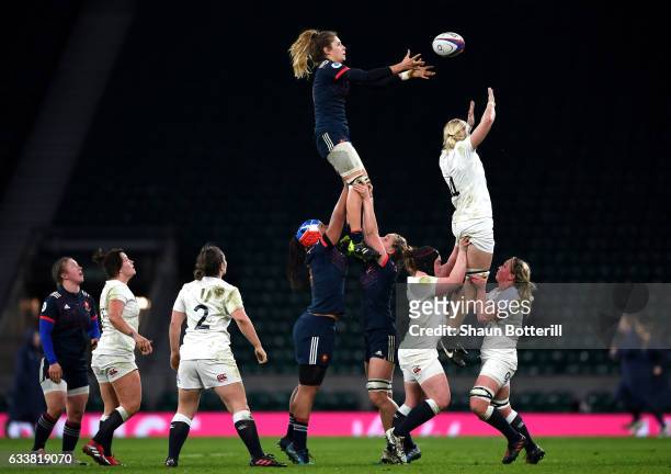 Marjorie Mayans of France and Tamara Taylor of England attempt to catch the line out throw during the Women's Six Nations match between England and...