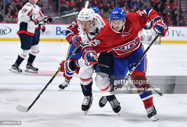 Brian Flynn of the Montreal Canadiens skates against Dmitry Orlov of the Washington Capitals in the NHL game at the Bell Centre on February 4, 2017...