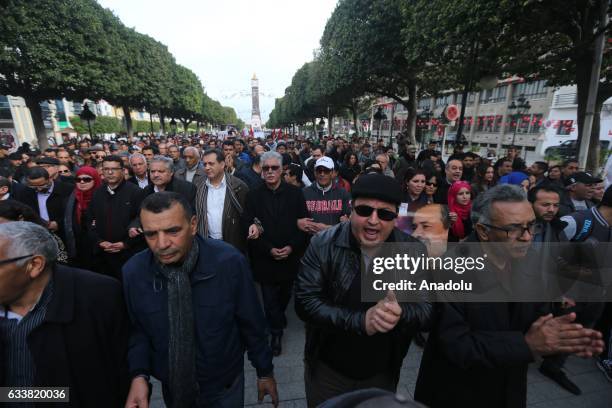 Tunisians gather during the death anniversary of the Chokri Belaid as they demand from Government to unveil the mystery of his death, in Tunis,...