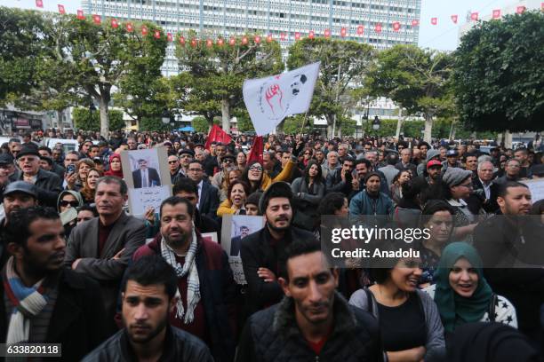 Tunisians gather during the death anniversary of the Chokri Belaid as they demand from Government to unveil the mystery of his death, in Tunis,...