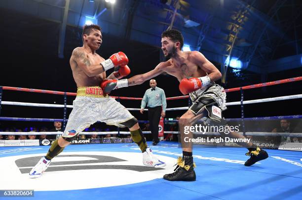 Andrew Selby of Wales in action with Ardin Diale of the Philippines during their WBC International Flyweight title fight at Olympia London on...