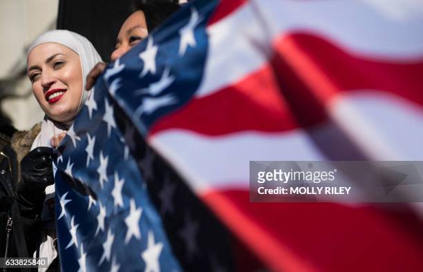 Zeina, who did not want to give her last name, takes part in a protest against US President Donald Trump outside the White House on February 4 in...
