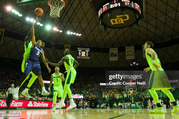 Kamau Stokes of the Kansas State Wildcats has his shot blocked by Jo Lual-Acuil Jr. #0 of the Baylor Bears on February 4, 2017 at the Ferrell Center...