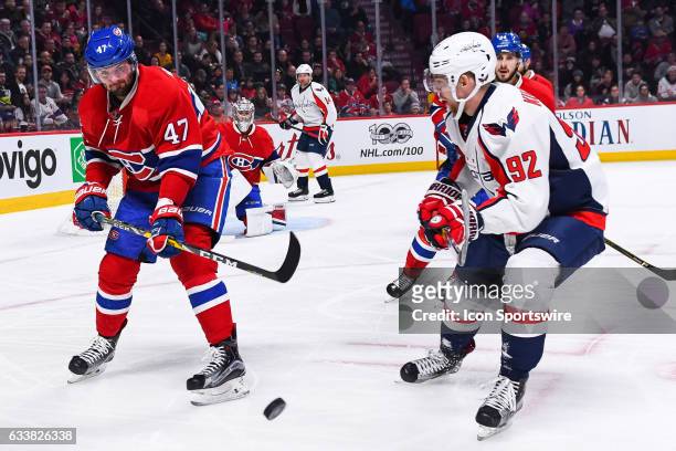 Montreal Canadiens Right Wing Alexander Radulov getting rid of the puck while being chased by Washington Capitals Center Evgeny Kuznetsov during the...