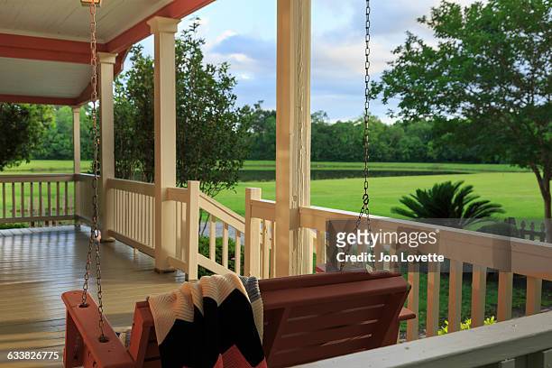 front porch at sunset - veranda maison stock pictures, royalty-free photos & images