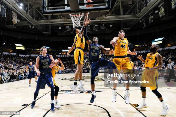 Georgia Tech Yellow Jackets guard Josh Okogie has his shot blocked by Wake Forest Demon Deacons forward John Collins during the second half on...