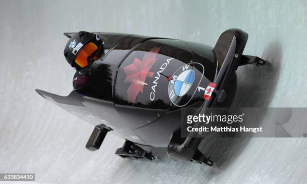 Kaillie Humphries and Melissa Lotholz of Canada compete during the Women's Bobsleight first run of the BMW IBSF World Cup at Olympiabobbahn Igls on...