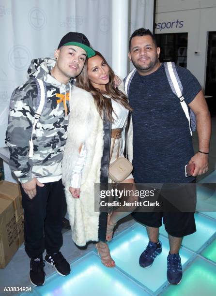 Internet personality Alexander Ospina, singer Adrienne Bailon, and Miguel Rivera attend Turner Ignite Sports Luxury Lounge on February 4, 2017 in...