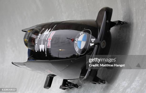 Mica McNeill and Montell Douglas of Great Britain compete during the Women's Bobsleight first run of the BMW IBSF World Cup at Olympiabobbahn Igls on...