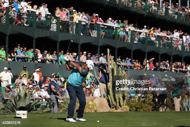 Hideki Matsuyama of Japan plays a tee shot on the 16th hole during the third round of the Waste Management Phoenix Open at TPC Scottsdale on February...