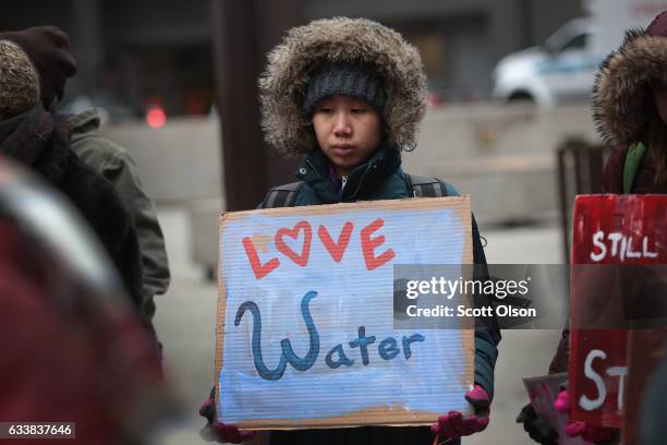 Demonstrators rally downtown before marching to Trump Tower while protesting the construction of the Dakota Access pipeline on February 4, 2017 in...