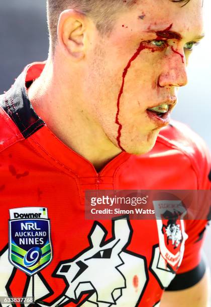Cameron McInnes of the Dragons leaves for medical attention during the 2017 Auckland Nines match between the New Zealand Warriors and the St George...