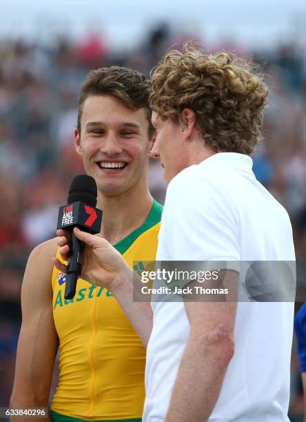 Kurtis Marschall of Australia is interviewed by Steve Hooker of Australia following the Men's Pole Vault during Nitro Athletics at Lakeside Stadium...