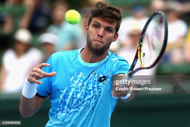 Jiri Vesely of Czech Republic competes in his singles match against Sam Groth of Australia during the first round World Group Davis Cup tie between...