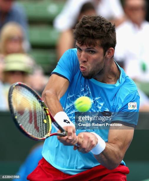 Jiri Vesely of Czech Republic competes in his singles match against Sam Groth of Australia during the first round World Group Davis Cup tie between...
