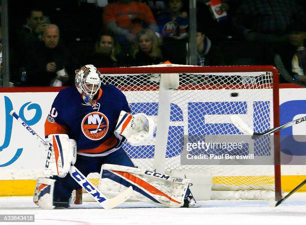 Jean-Francois Berube of the New York Islanders allows a first period goal to Jaccob Slavin of the Carolina Hurricanes at Barclays Center on February...