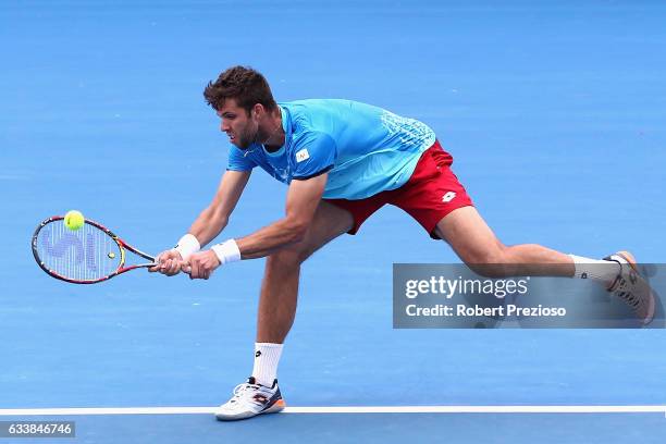Jiri Vesely of Czech Republic competes in his singles match against Sam Groth of Australia during the first round World Group Davis Cup tie between...