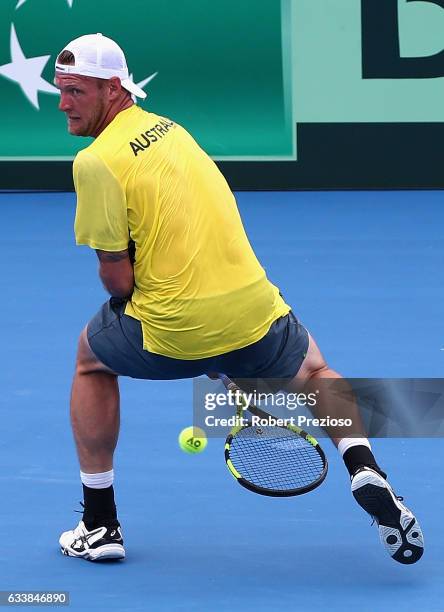 Sam Groth of Australia competes in his singles match against Jiri Vesely of Czech Republic during the first round World Group Davis Cup tie between...