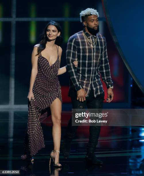 Emily Ratajkowski and Odell Beckham Jr. Of the New York Giants present the present the AP Offensive Rookie of the Year to quarterback Dak Prescott of...