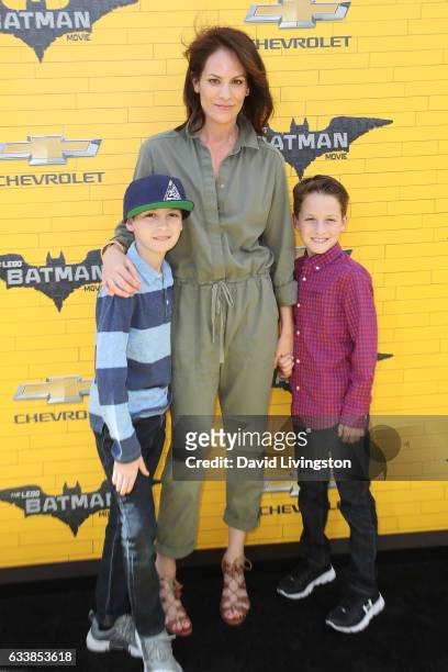 Actress Annabeth Gish and her sons Cash Allen and Enzo Allen attend the Premiere of Warner Bros. Pictures' "The LEGO Batman Movie" at the Regency...