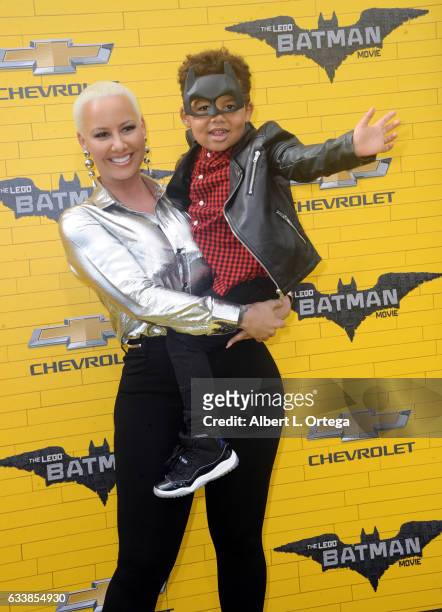 Model Amber Rose and son Sebastian Taylor Thomaz arrive for the Premiere Of Warner Bros. Pictures' "The LEGO Batman Movie" held at Regency Village...