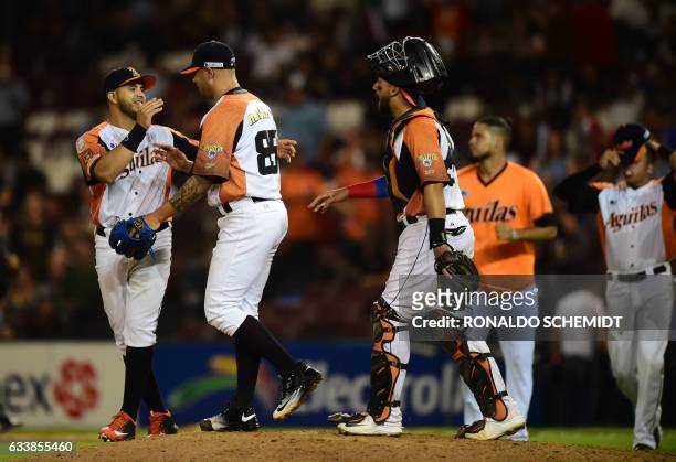 Pitcher Hassan Pena of Aguilas del Zulia from Venezuela celebrates victory with teammates over Alazanes de Granma from Cuba following their Caribbean...