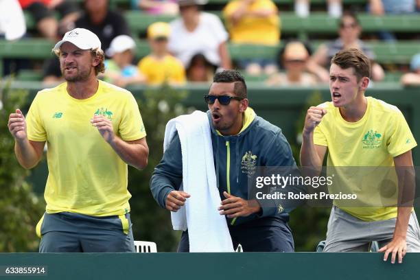 Nick Kyrgios of Australia shows his support as Jordan Thompson of Australia competes in his singles match against Jan Satral of Czech Republic during...