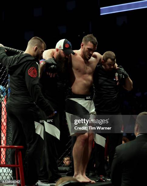 Adam Milstead is assised out of the octagon after the fight against Curtis Blaydes during UFC Fight Night at the Toyota Center on February 4, 2017 in...