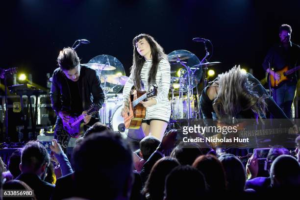 Musicians Neil Perry, Kimberly Perry and Reid Perry of The Band Perry perform onstage during the Taste Of The NFL 'Party With A Purpose' at Houston...